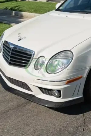 Mercedes W211 E63 AMG Carbon Fiber Lip Spoiler mercw21101 Shop Now