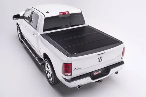 BAKFlip F1 Gloss Black Tonneau Cover for 2012-2018 Ram 1500 (19-22 Classic) Ram 1500 / 2012-2023 2500/3500 6'4" with Ram Box & Cargo Rails #772203RB Worldwide Shipping